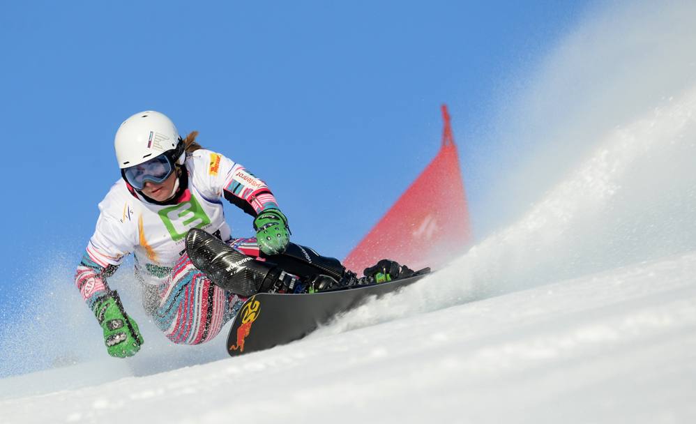 A Kreischberg, sempre in Austria, i Campionati mondiali di snowboard: la ceca Ester Ledecka plana sulla neve, durante le qualificazioni dello slalom parallelo femminile. (Afp)